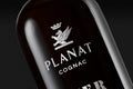 Planat Cognac Over Proof 65% — détail bouteille sérigraphiée sur fond noir